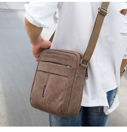 迪阿倫 男士單肩包商務(wù)旅行包豎款小包包斜挎休閑包帆布潮男包